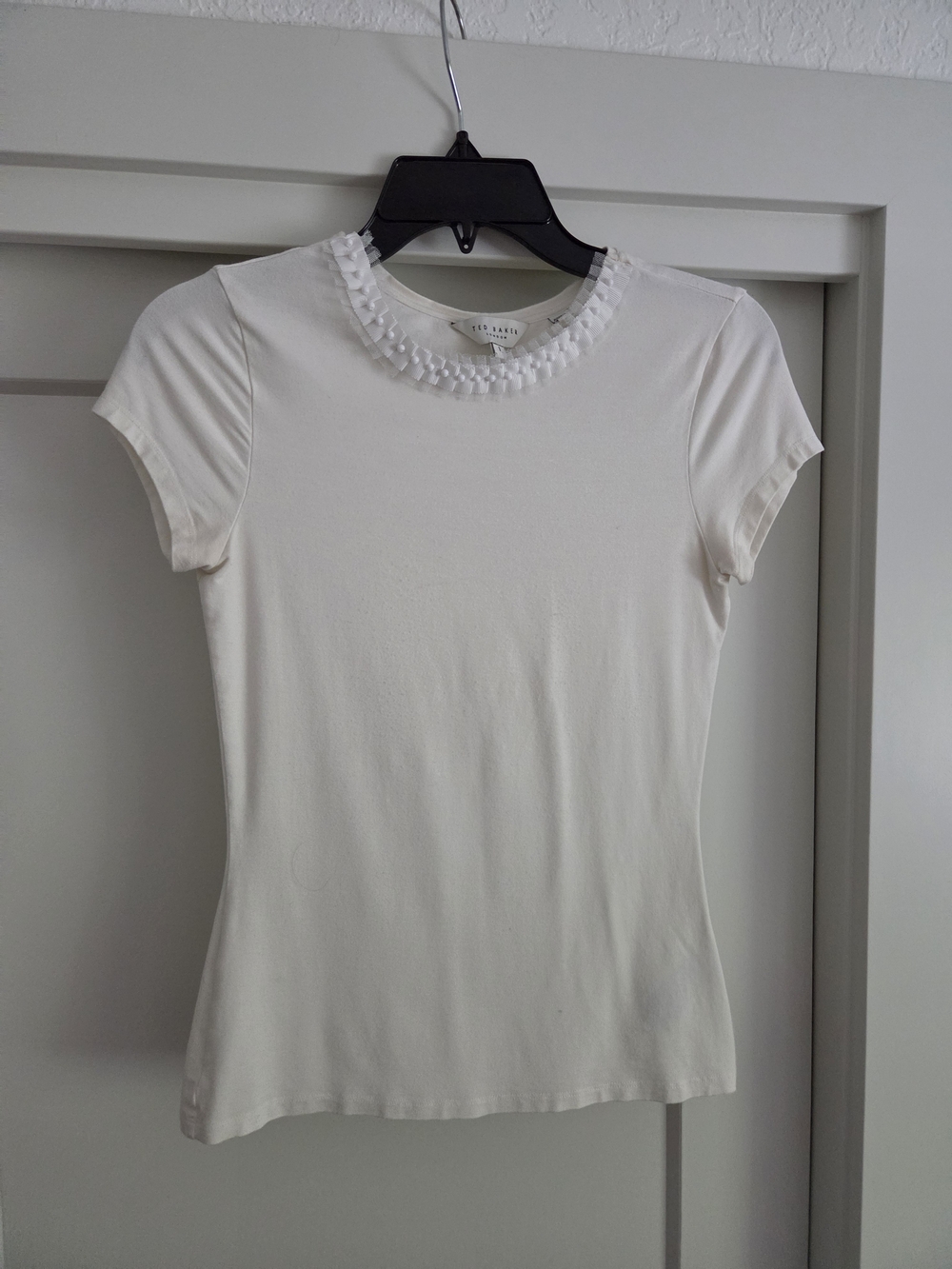 Premium brand, beautiful stretchy top w beautiful details